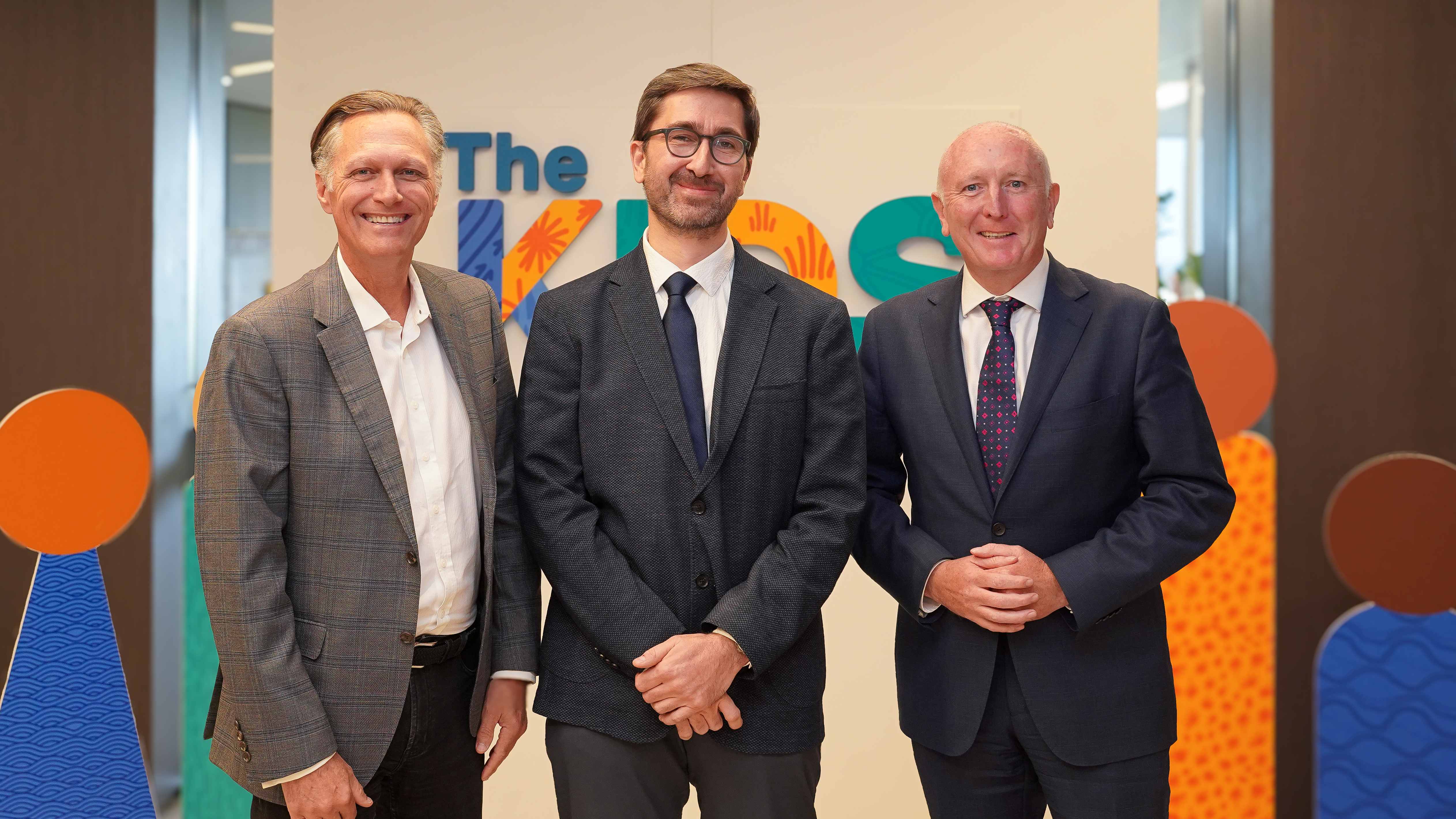 A photo of Jonathan Carapetis, Mirko Uljarevic and Minister Stephen Dawson.